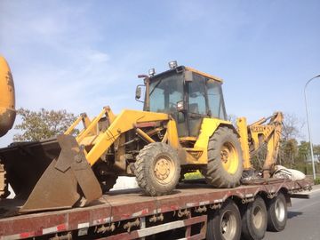 يستعمل زنجير JCB-3CX أماميّ نهاية محمل ثقيل معدّ آليّ غرافة
